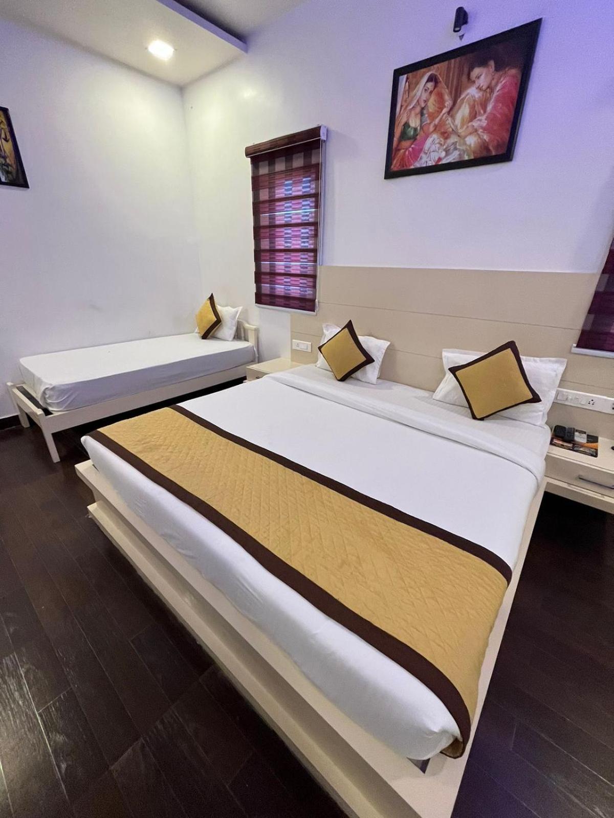 Hotel Red Carpet Tājganj Quarto foto